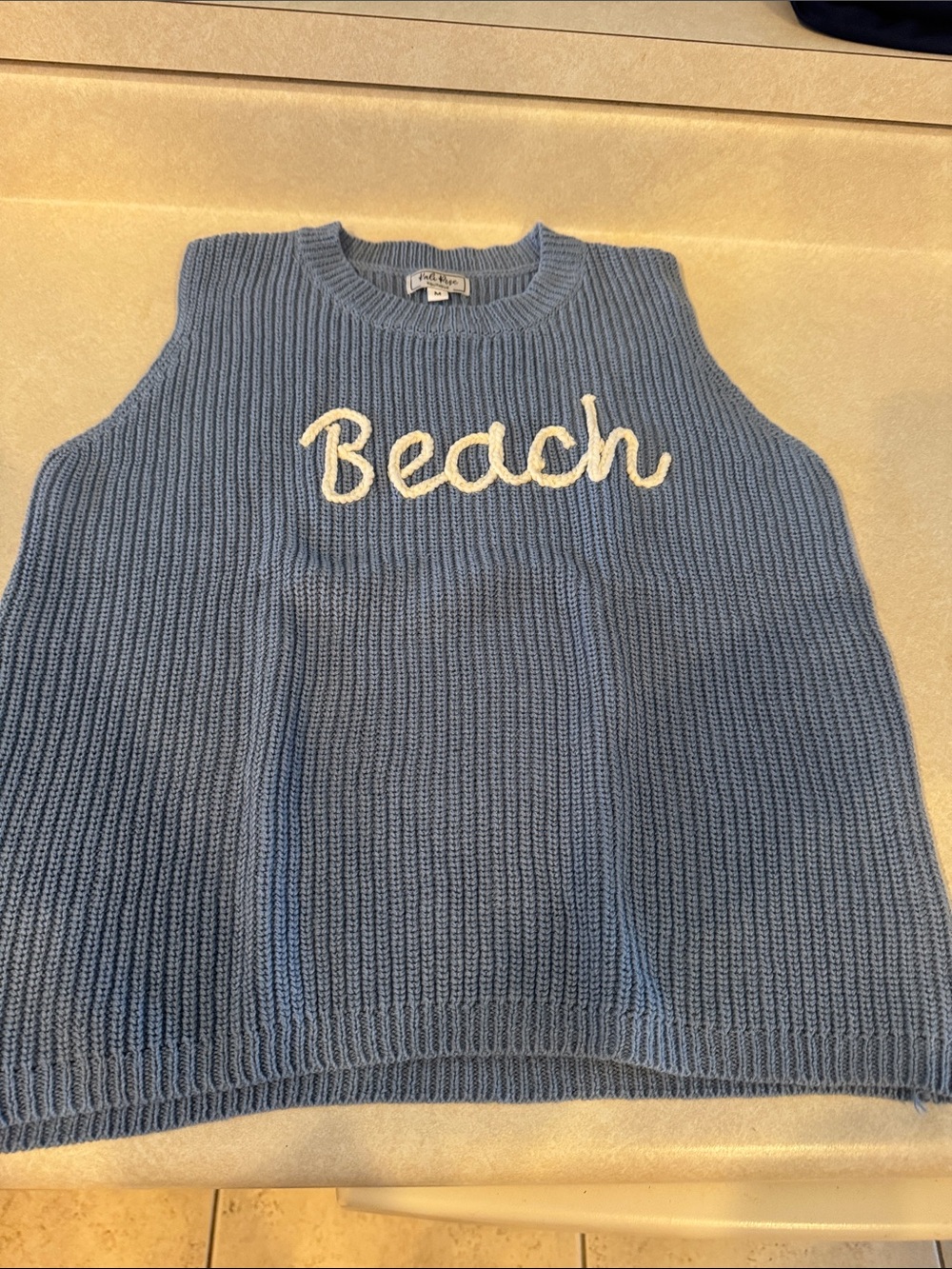 Kali RoseLight Blue Ribbed Knit Sleeveless Sweater with White 'Beach' Embroidery
